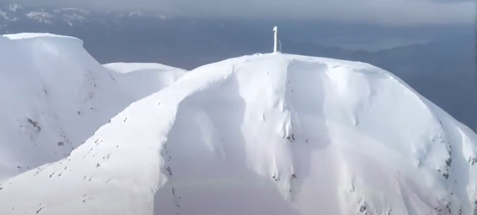 Power Generator in the snow on top of a mountain